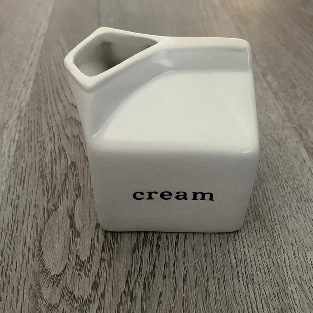 Crate & Barrel cream container/server